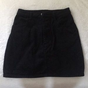 Black denim skirt with high rise buttons